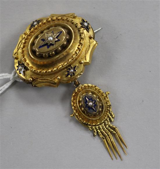 A Victorian yellow metal, enamel and seed pearl set drop tassel brooch, overall 7cm.